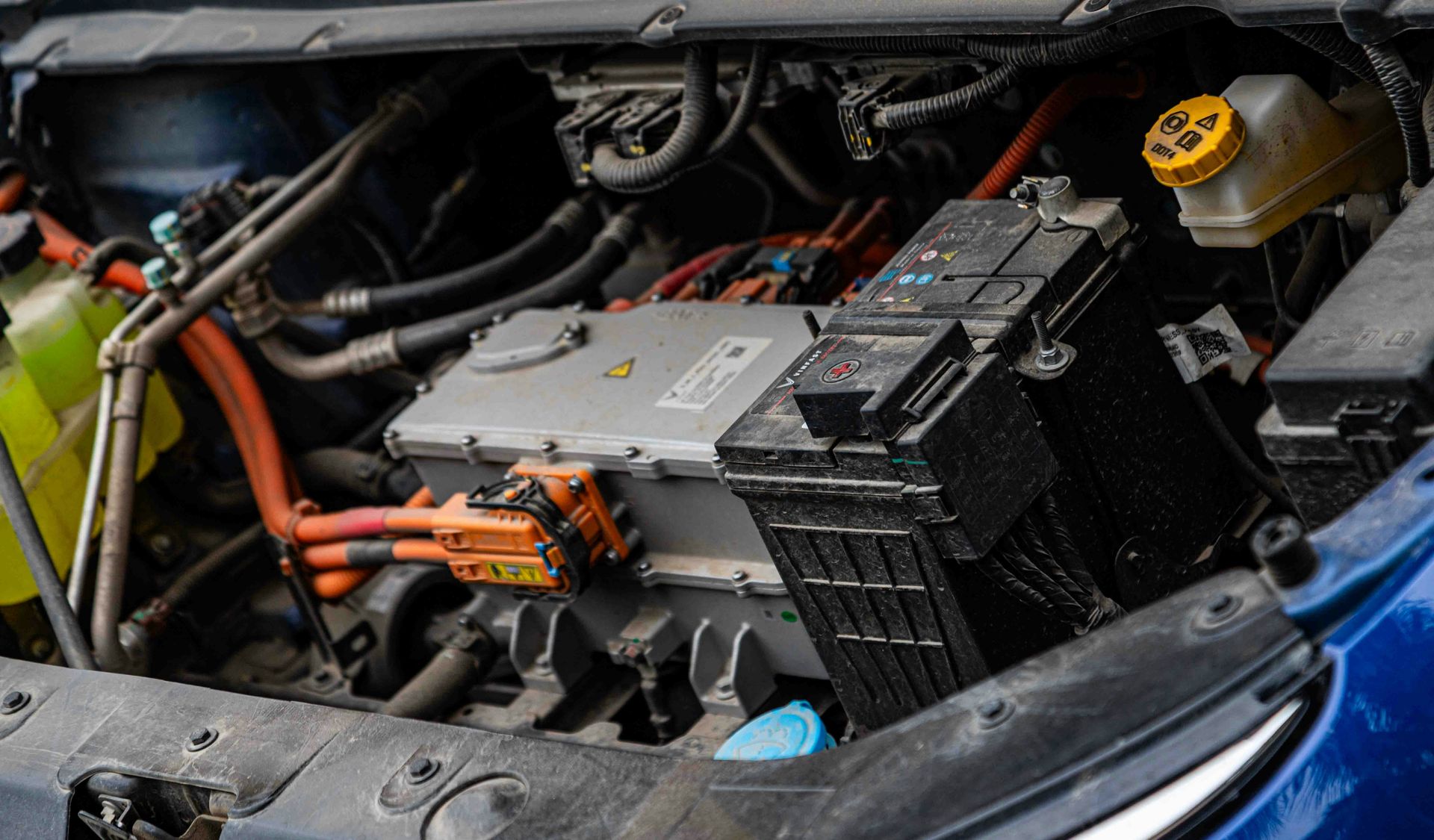 Electric car engine with visible wiring and battery components